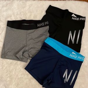 3 pairs of Nike Pros